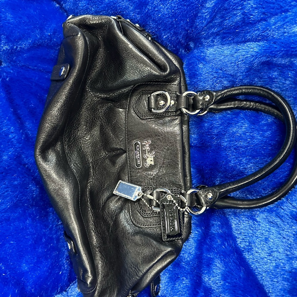Gorgeous vintage Coach leather satchel.  Purple interior. No long strap.